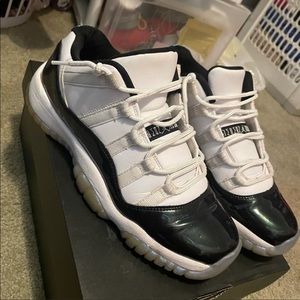 Jordan 11’s concord lows have a little wear to them but not much